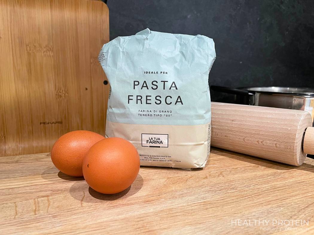 Homemade fresh pasta ingredients - 00 flour and eggs - make pasta yourself